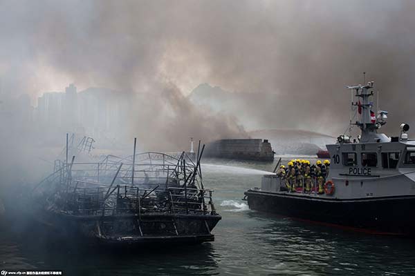 Huge fire sweeps through vessels in Hong Kong's Victoria Harbour