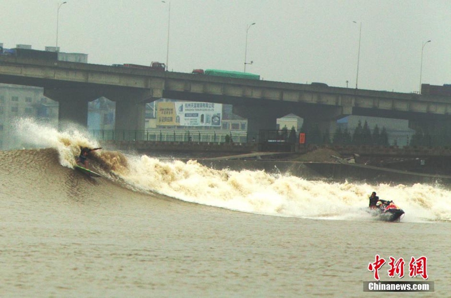 Surfing competition held on Qiantang River