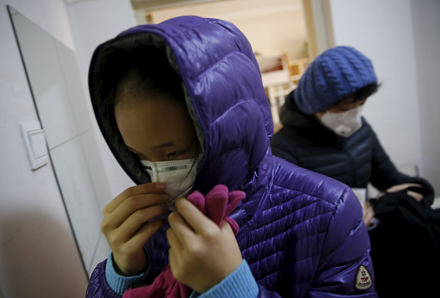 Life of a family amid Beijing's red alert smog