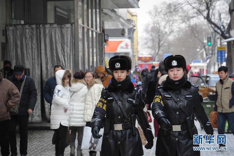 Policewomen on duty in minus 30 degrees Celsius of NE China