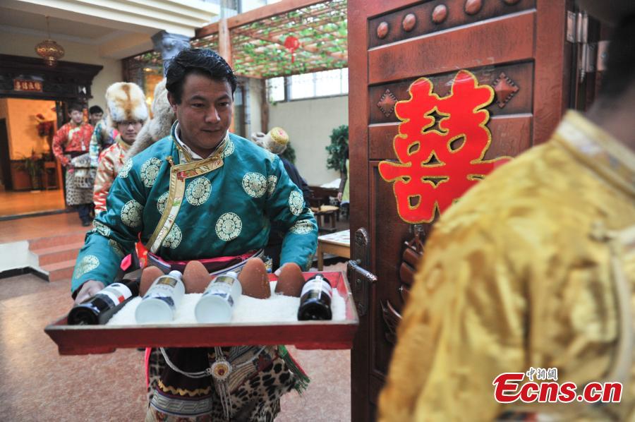 Young couple holds traditional Tibetan wedding ceremony