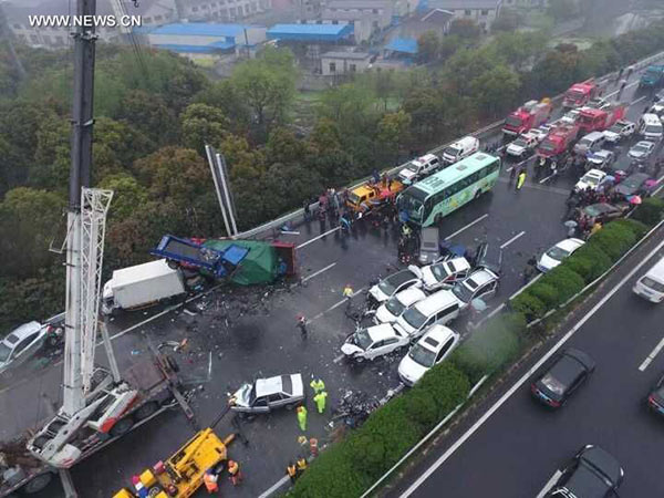 Two people died, dozens injured in east China's highway pileup