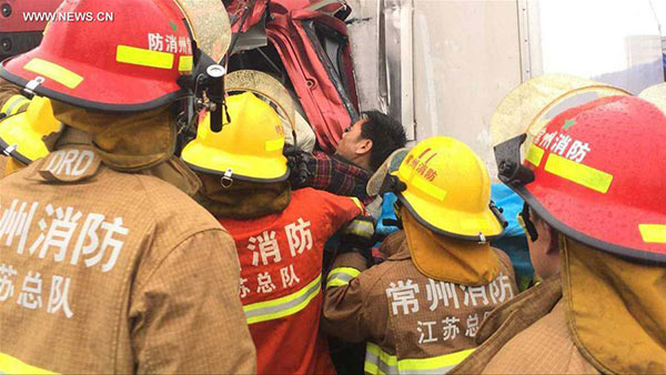 Two people died, dozens injured in east China's highway pileup