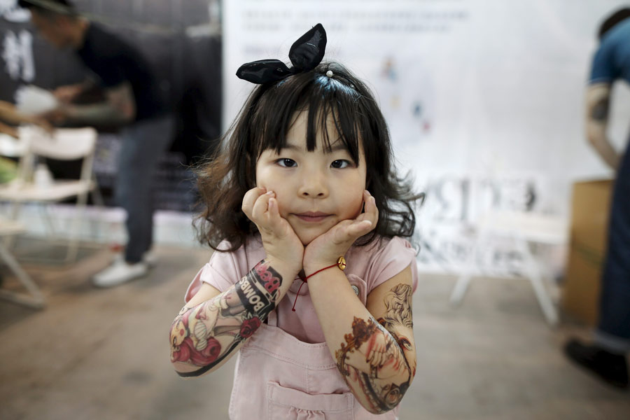Tattoo fans, artists gather at Shanghai international art festival