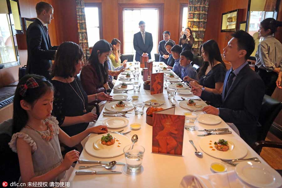 Chinese children paying money to learn British manners