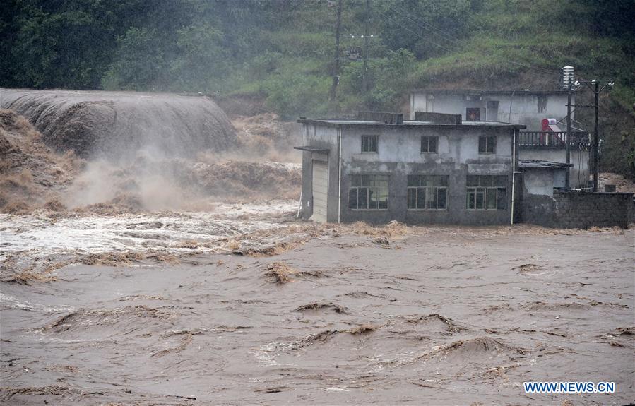 China warns of geological disasters as rainstorm triggers another orange alert