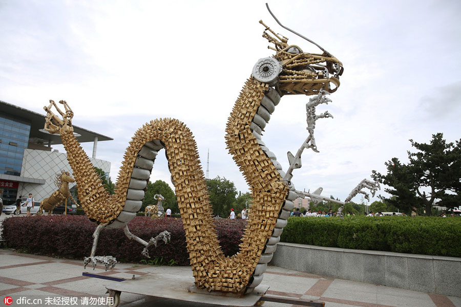 Students turn scrap parts into animal statues