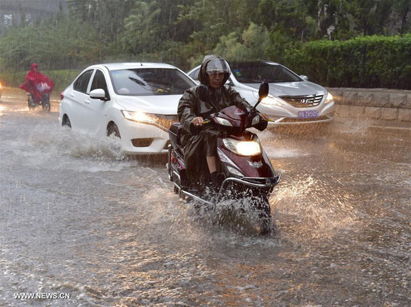 Orange alert for rainstorms maintained across China