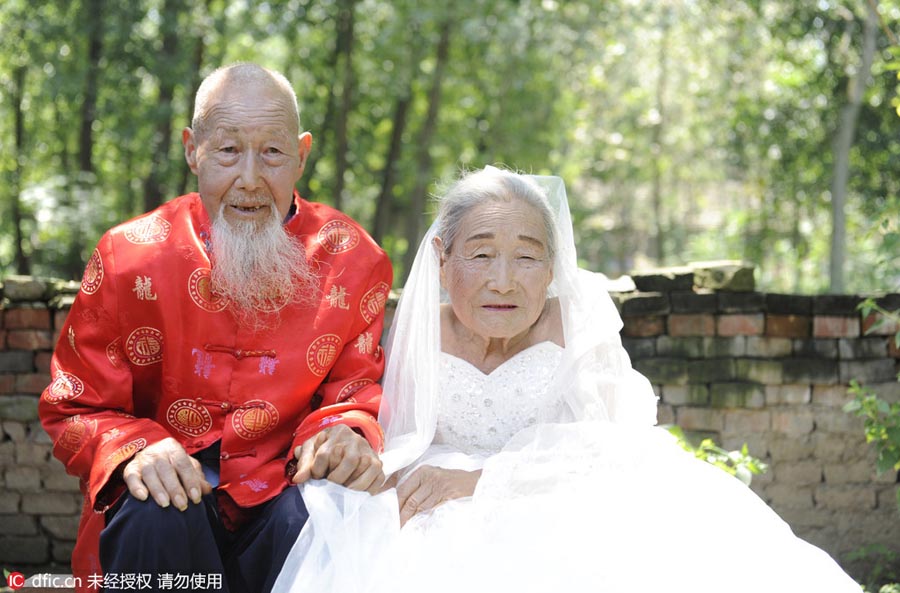 Centenarian couple embrace diamond wedding anniversary
