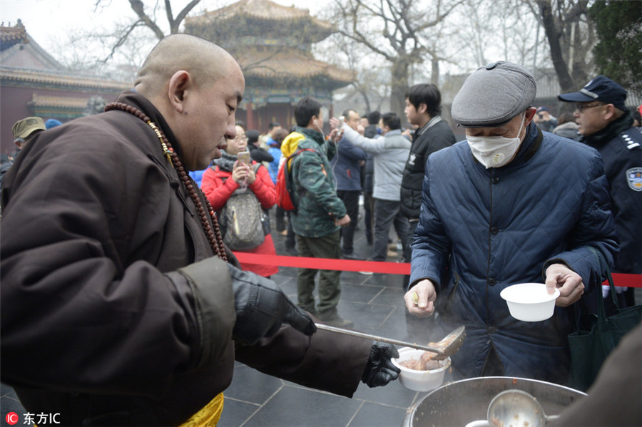 Chinese mark festival with 'eight treasure porridge'