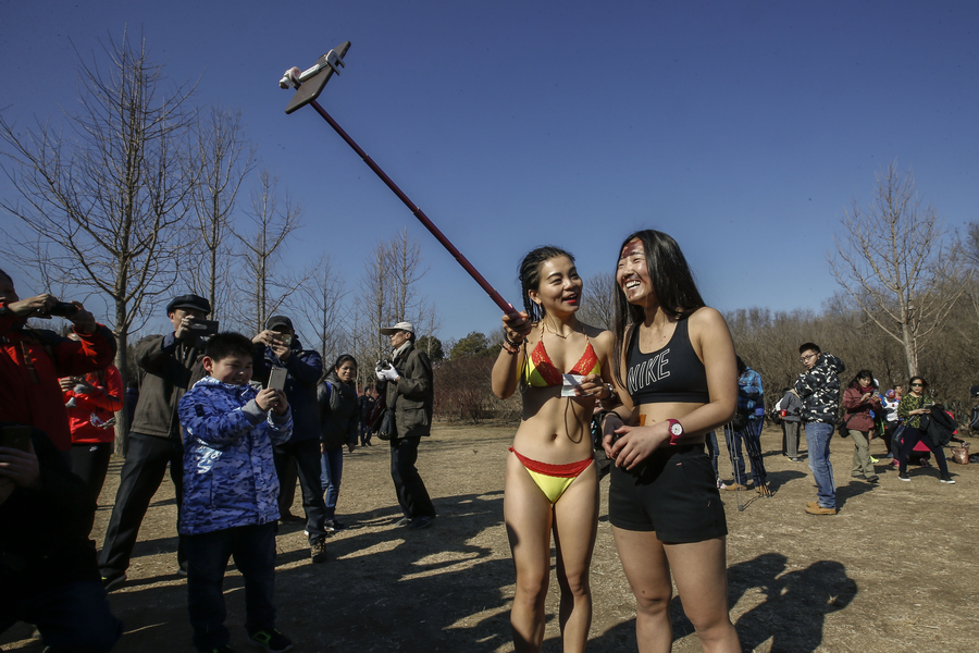 Reporter steals the show at Beijing Naked Run
