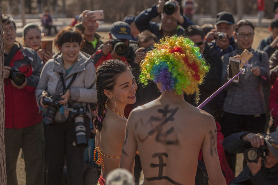 Reporter steals the show at Beijing Naked Run