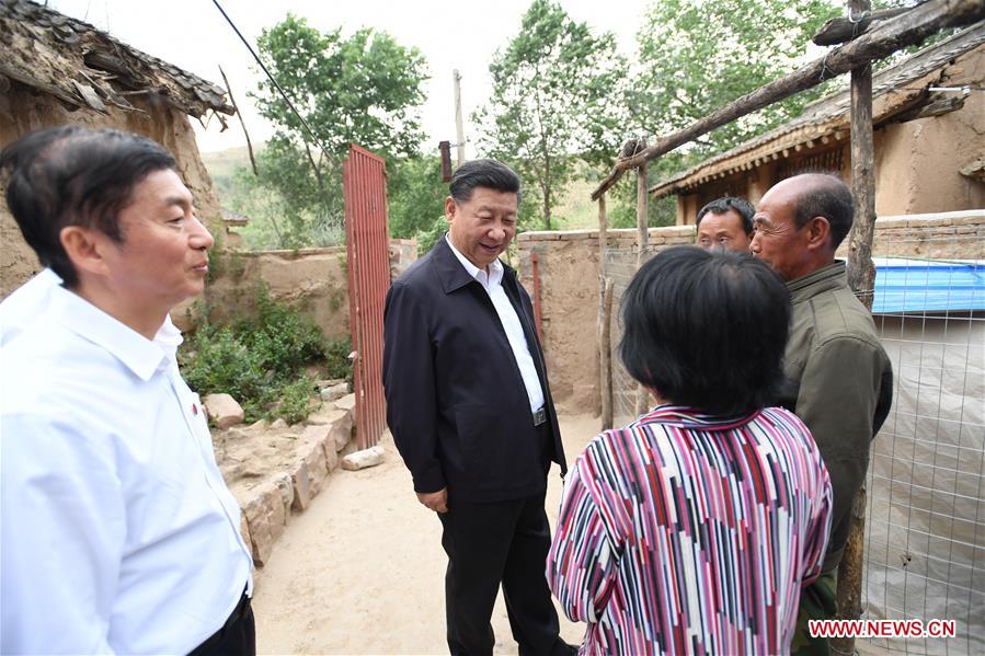 Xi's Shanxi tour steps up war on poverty