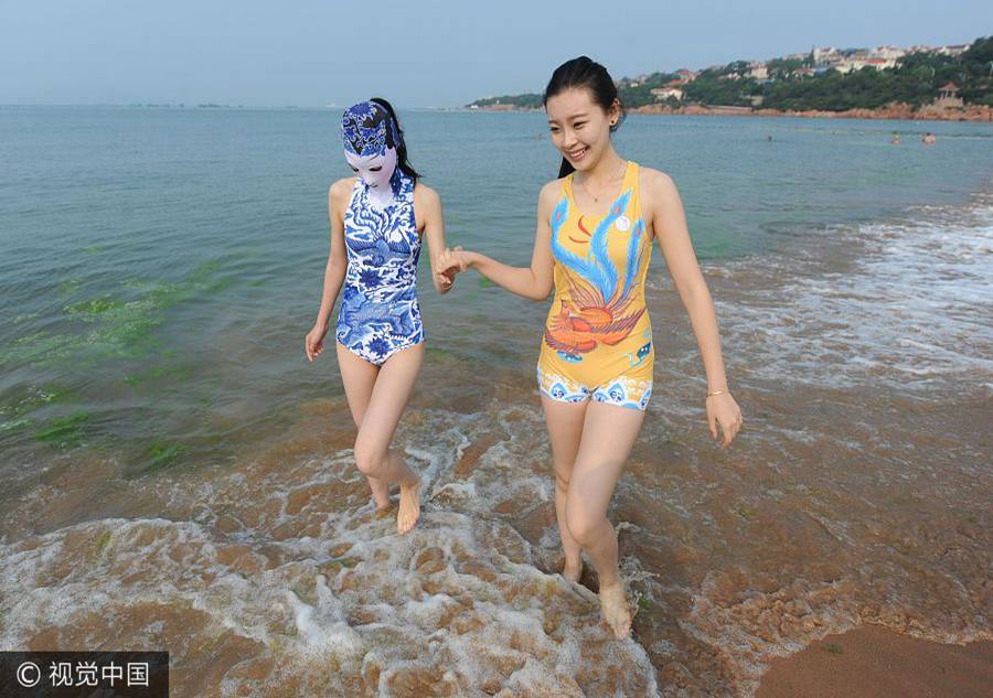 'Facekini' beauties attract plenty of attention at the beach