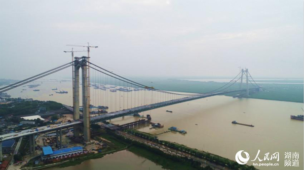 World's second big-span steel beam suspension bridge to open to traffic