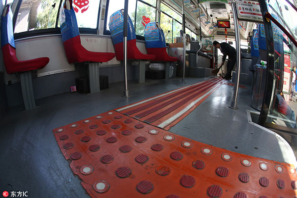 Bus driver wins patent for tactile paving