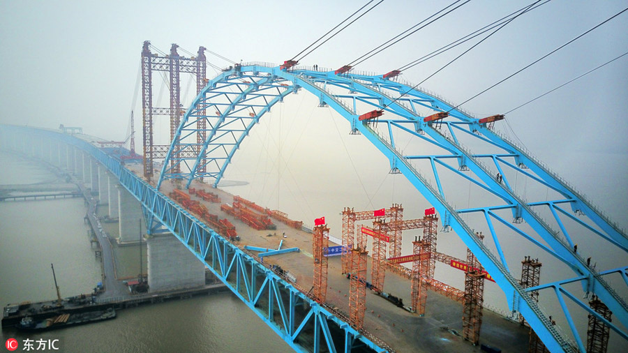 Arch of world's longest cable-stayed bridge joined
