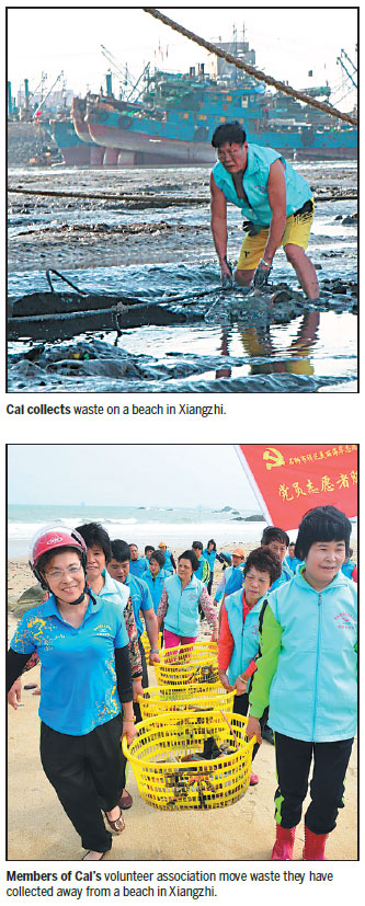 Veteran swimmer leads Fujian beach cleanup