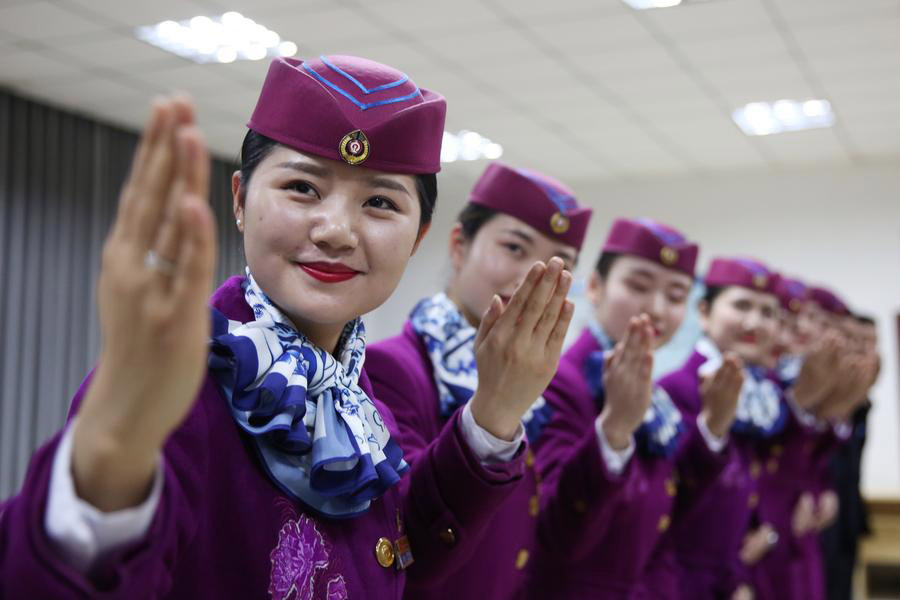 High-speed train stewardesses receive training in SW China