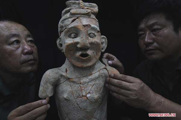 Terracotta portrait discovered in N China's prehistoric site