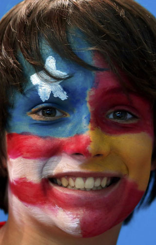 Painted faces of Olympic fans