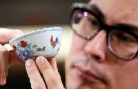 Collector pays $36 million for tea cup