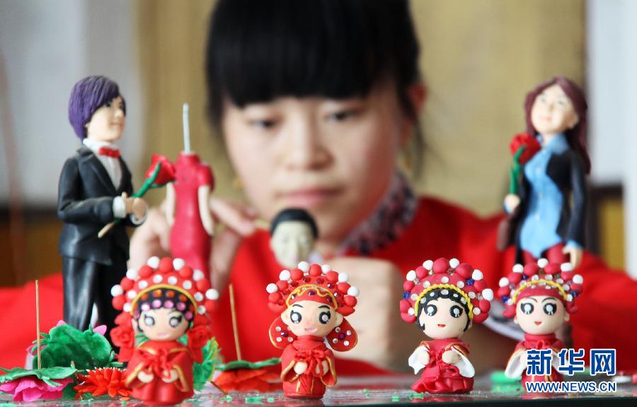 Dough figurines pinched for Chinese Valentine's Day