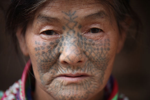 China traces health condition of face-tattooed women