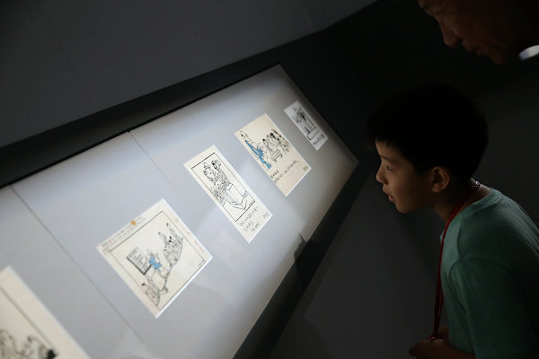 Cartoon exhibition held to commemorate Hua Junwu