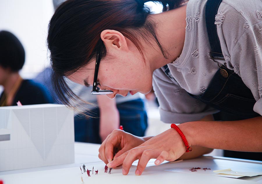 Japanese architect scales down Beijing in paper-cuts