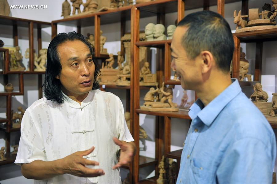 Clay sculptures created by craftsman in Gansu