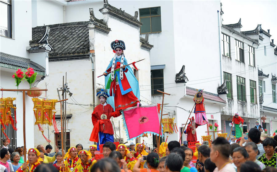 Folk dance Taige shows history, color and music in Wuyuan