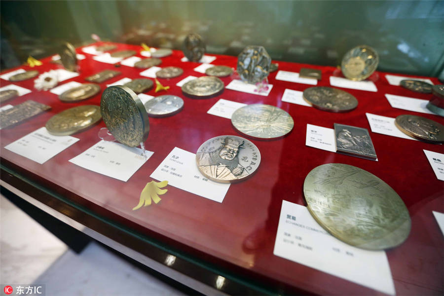 Coin art exhibition opens in Shanghai