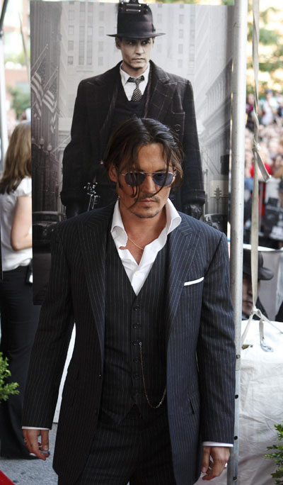 Johnny Depp,Marion Cotillard arrive for 