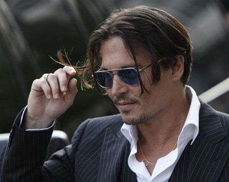 Johnny Depp,Marion Cotillard arrive for 