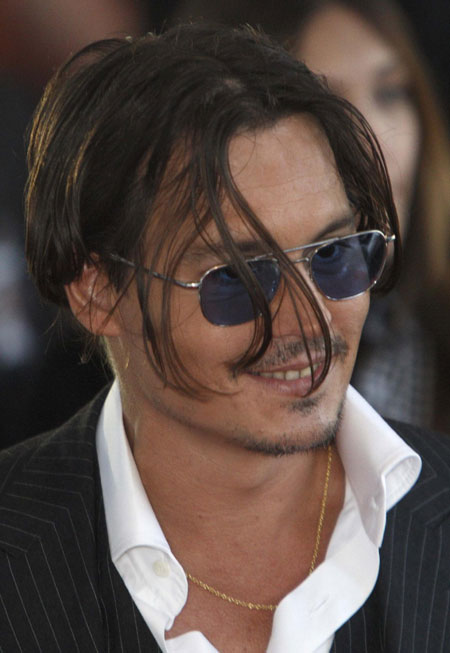 Johnny Depp,Marion Cotillard arrive for 