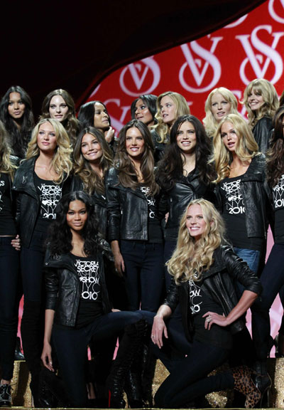 Victoria's Secret models pose at a preview for annual Fashion show