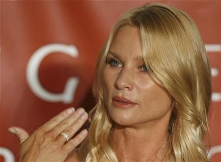 Nicollette Sheridan drops abuse claims in lawsuit