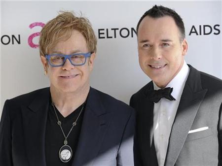 Rocker Elton John and partner adopt baby boy: report