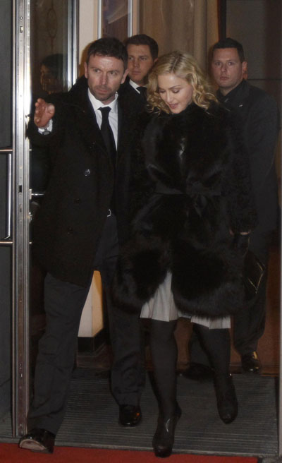 Madonna leaves a restaurant at Berlin's Gendarmenmarkt square