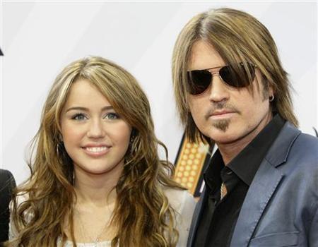 Miley's dad drops divorce, loves 'Hannah Montana'