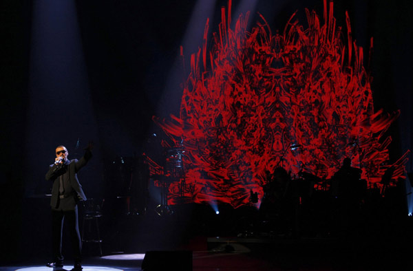 George Michael performs during his concert in Prague