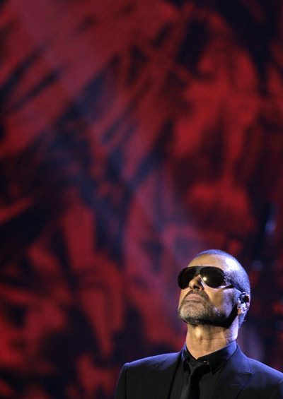 George Michael performs during his concert in Prague