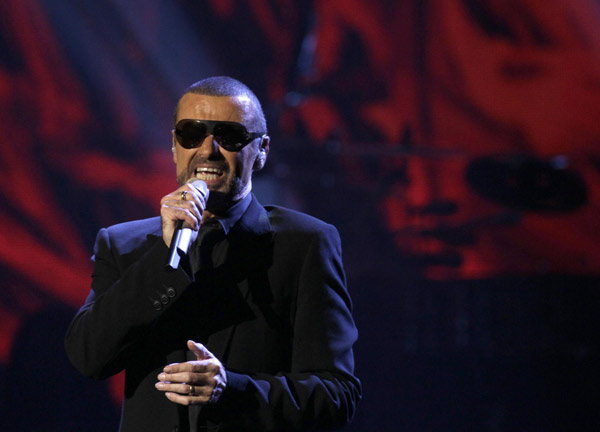 George Michael performs during his concert in Prague