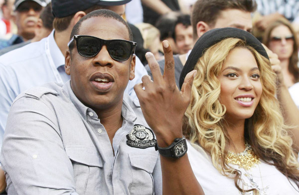 Jay-Z and Beyonce attend the match between Djokovic and Nadal