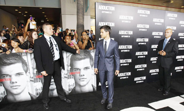 Taylor Lautner attends 'Abduction' world premiere
