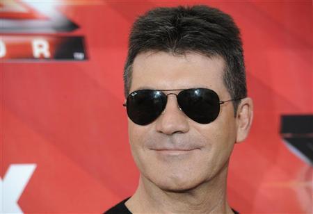 Simon Cowell learns to keep mouth shut