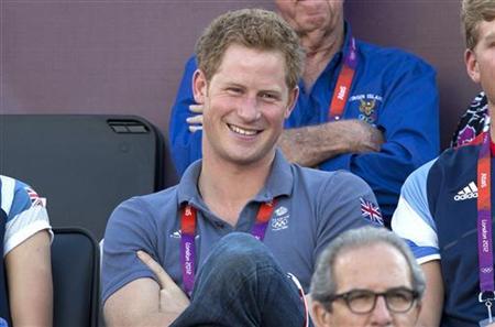 Prince Harry cavorts naked in photos