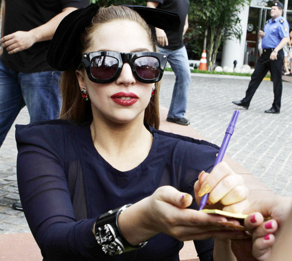 Lady Gaga signs autographs for fans