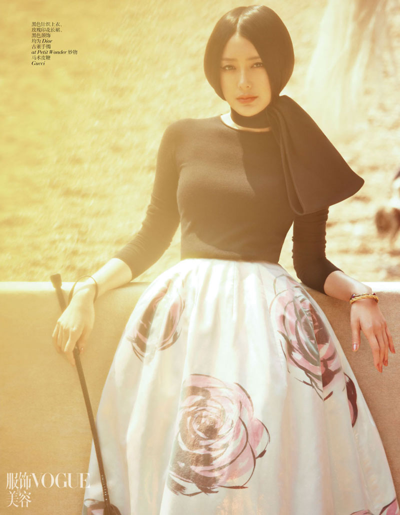 Qin Lan poses for Vogue magazine